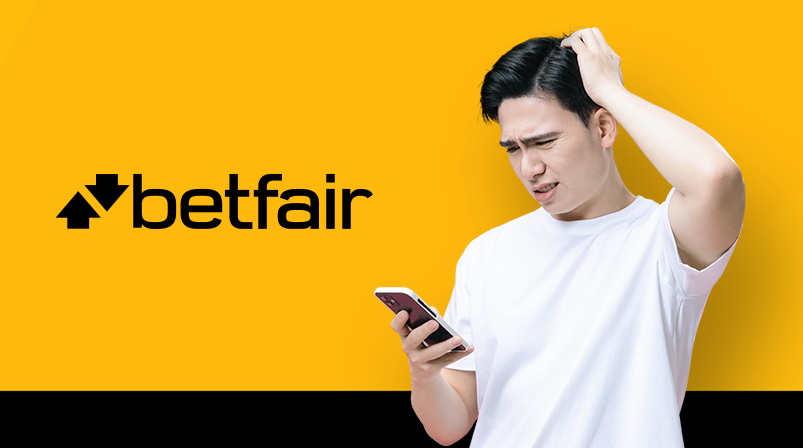 Imagem mostra homem pensativo ao utilizar um celular ao lado da Betfair
