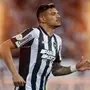 Tiquinho Soares, do Botafogo, perde a liderança na disputa pelo prêmio Bola de Ouro para Luis Suárez